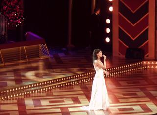 Singing 'La Lumbre' at Carols by Candlelight 2002.